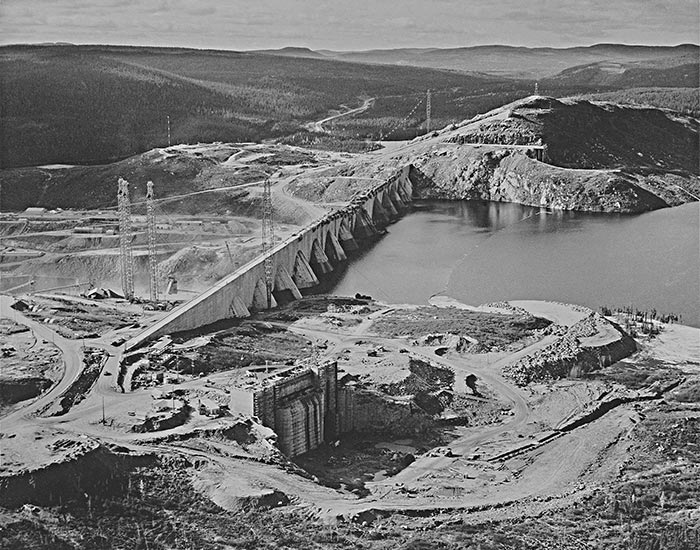 the dam in in progress, partially poured with the reservoir low