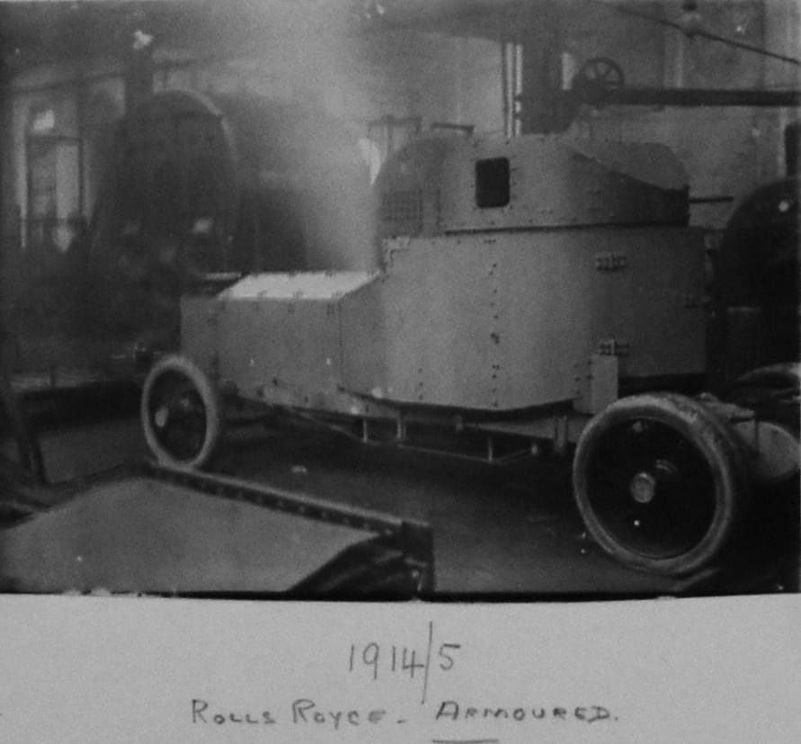 the caption reads: 1914 / 1915 Rolls Royce, armoured. The car is covered in bolted on steel plate.